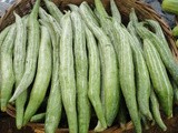 Narkel diye Chichingey chhenchki( Snake gourd dry curry with coconut in bengali style)