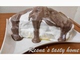 Butter cake with cream and chocolate topping