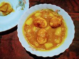 Egg and potato curry with ground roasted rice flour and grated fermented bamboo shoots
