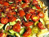 Melted Leeks, Roasted Tomatoes and Zucchini, and Pancetta Tart