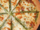 Garlic scape and olive oil cheese pizza