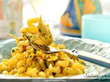 Riccioli con patate, carciofi e bottarga