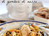 Spaghetti aglio e olio con melanzane e crudo e cotto di gamberi di nassa