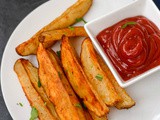 Baked Potato Wedges | Potato Wedges In Oven Recipe | Easy Baked Potato Wedges Recipe | Vegan Baked Potato Wedges