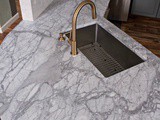 My Carrara Marble Kitchen and Tips for Choosing Marble Countertops