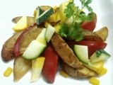 Wedges of potato and tomato with double zuchini salad