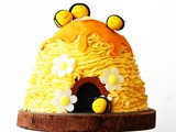 3D Beehive Cake with honey drips and buzzing bees