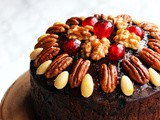 Naked Christmas Cake with Glazed Nuts and Cherries
