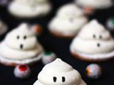 Terrifying Teacakes – chocolate biscuits topped with jam and marshmallow ghosts
