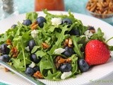 Arugula & Blueberry Salad w/ Goat Cheese, Honeyed Sunflower Seeds &  Strawberry Vinaigrette