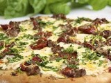 Pesto Pizza w/ Italian Sausage, Slow-Roasted Tomatoes & Spring Herb Gremolata