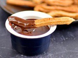 Vegan churros with chocolate sauce