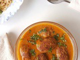 Nadia bara jhol /Coconut and lentil dumplings in a thick gravy
