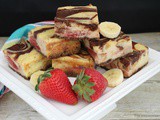 Chocolate Marbled Strawberry Bananas Foster Cheesecake Bars