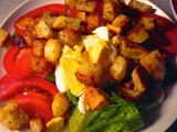 Roasted and Seasoned Warm Cubed Potatoes Replace Croutons on Green Salad Paired with Old World Spaetzle