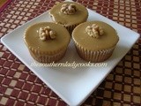 Raisin cupcakes with caramel frosting