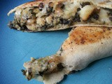 White bean, spinach, mushroom, potato, and cheese quesadilla