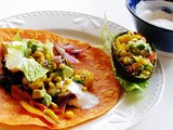 Spicy black bean wrap with mango, avocado and burnt corn salsa