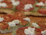 Cauliflower Pizza Crust with Pesto and Tomatoes