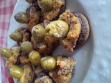 Champignon ripieni con salsiccia e olive