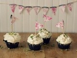 Chocolate olive oil cupcakes with goat cheese frosting and pistachios