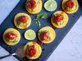 Polenta Bites with Guacamole and Roasted Tomatoes