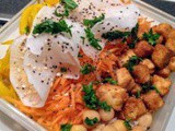 Buddha bowl for lunch box with rice, beetroot, carrots, daikon, chickpea and crispy tofu