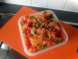Lunch box: salad with avocado, tomato and smoked salmon