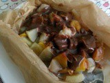 Steamed fruits parcel with chocolate sauce