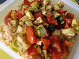 Tomato and courgette oven cooked with olive oil and mixed herbs