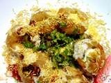 Chaat  ( Spicy Tangy sweet mixture of crushed puris and vegetables )