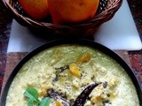 Mambazha Puliseri  ( Ripe mangoes cooked in  a creamy yogurt coconut gravy )