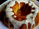 Orange and Cranberries cake with Orange glaze ( eggless )