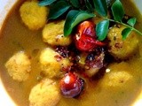 Paruppu Urundai Kuzhambu  (Ground  Lentil balls cooked in a spicy tangy Tamarind sauce)