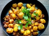 Spicy Jeera Aaloo   ( Baby potatoes tossed in  crushed cumin seeds and aromatic Indian spices )