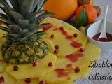Carpaccio di ananas con salsa al melagrana