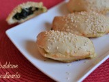 Panzerotti al forno con tarassaco e pecorino